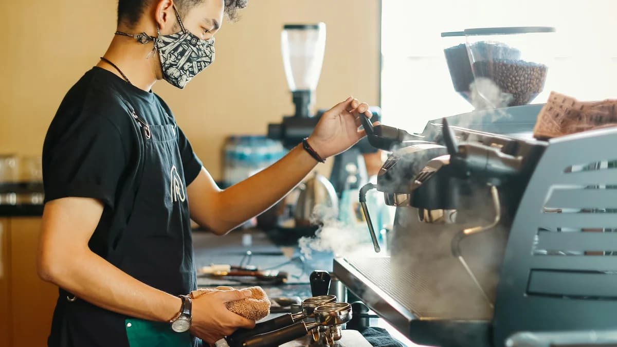Ilustrasi barista menyiapkan kopi di kedai